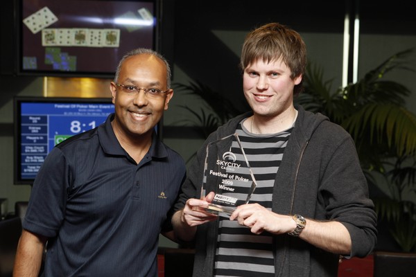 KYCITY Festival of Poker winner Simon Watt; Simon in action earlier in the day and Simon with Executive Manager of Table Games, Ejaaz Dean and his trophy.